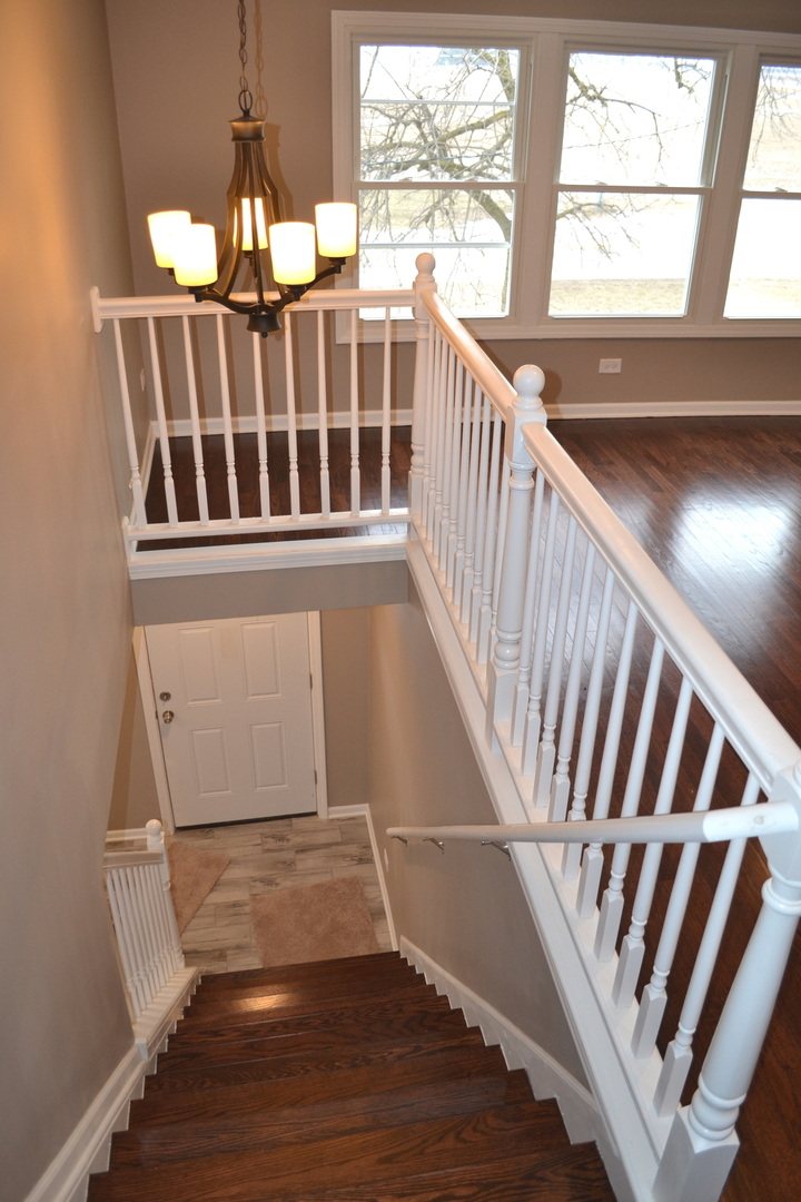 41W910 Burlington Road St. Charles, IL 60175 - Photo 22 of 32 a view of an entryway with wooden floor