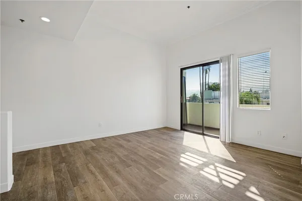 a view of a living room with furniture