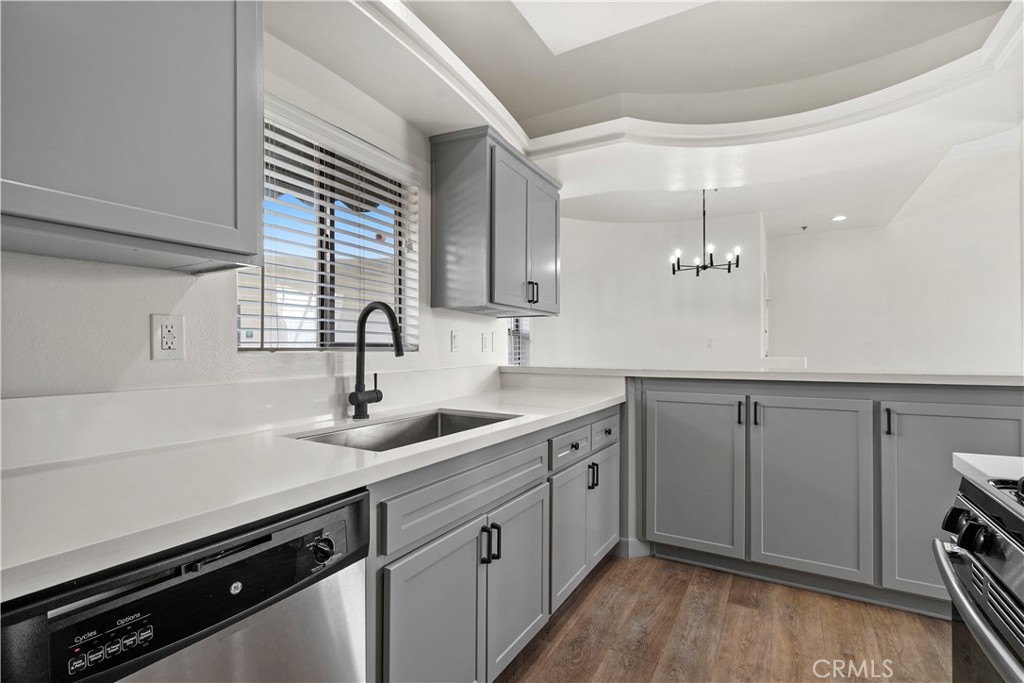 4623 Willis Avenue, Unit 305 Sherman Oaks, CA 91403 - Photo 36 of 74 a kitchen with a sink and cabinets