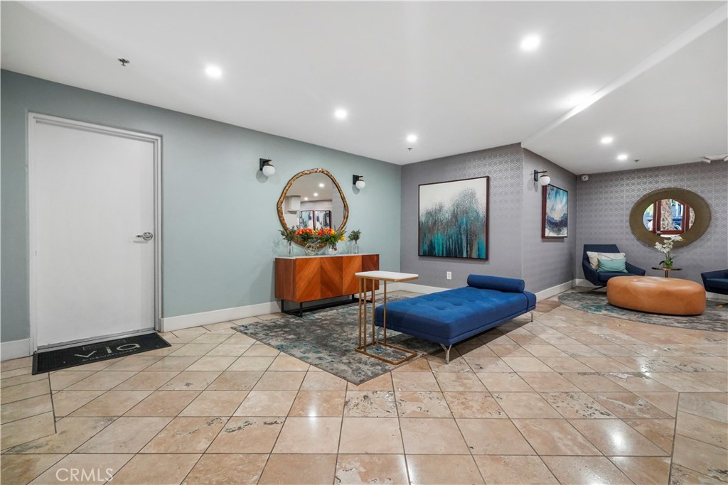 4623 Willis Avenue, Unit 305 Sherman Oaks, CA 91403 - Photo 4 of 74 a living room with furniture and a window