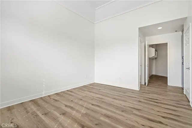 a view of a chairs and table in backyard of a house