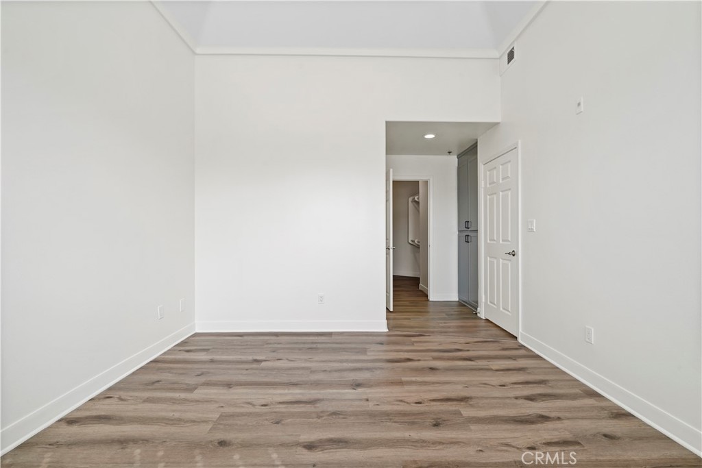 4623 Willis Avenue, Unit 305 Sherman Oaks, CA 91403 - Photo 47 of 74 a view of a room with wooden floor