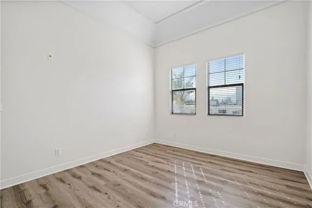 a view of parking garage with cars