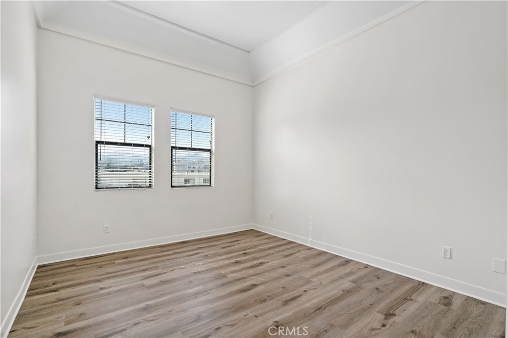 4623 Willis Avenue, Unit 305 Sherman Oaks, CA 91403 - Photo 51 of 74 wooden floor in an empty room