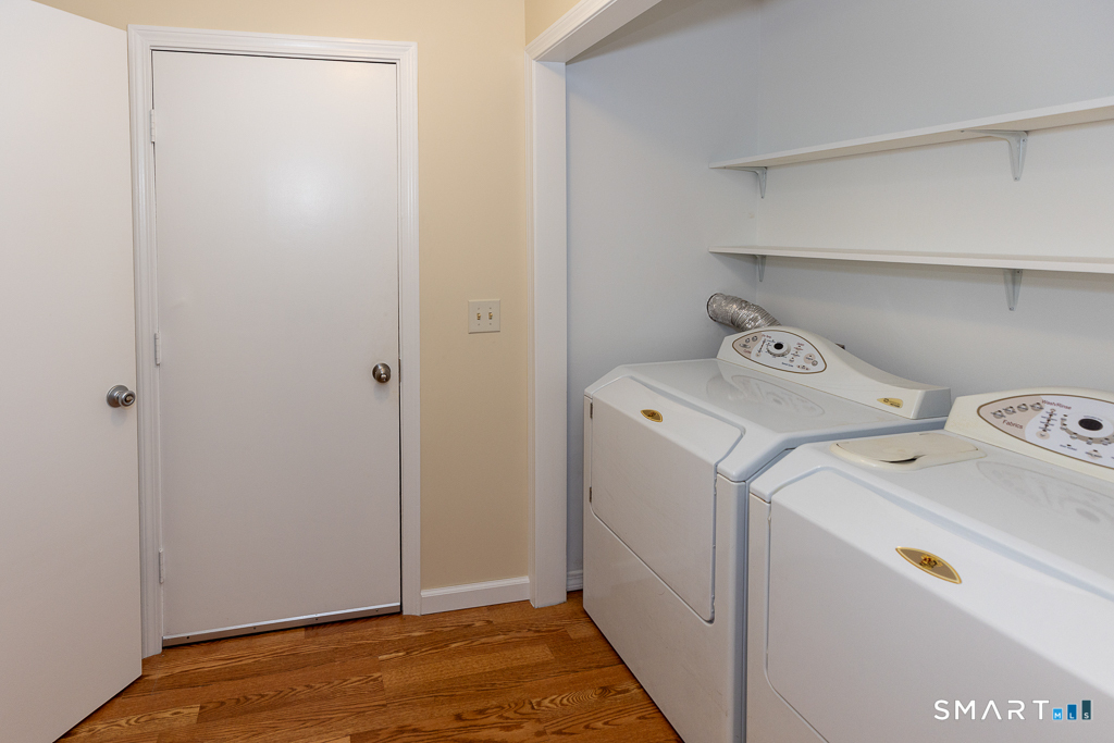 428 Hammock Road Westbrook, CT 06498 - Photo 16 of 40 Laundry room with shelving