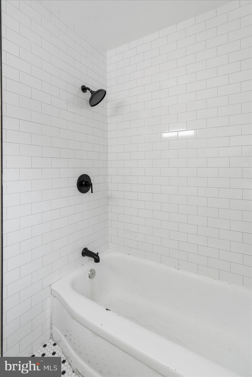 1444 Meridene Drive Baltimore, MD 21239 - Photo 31 of 36 a bathroom with a bathtub