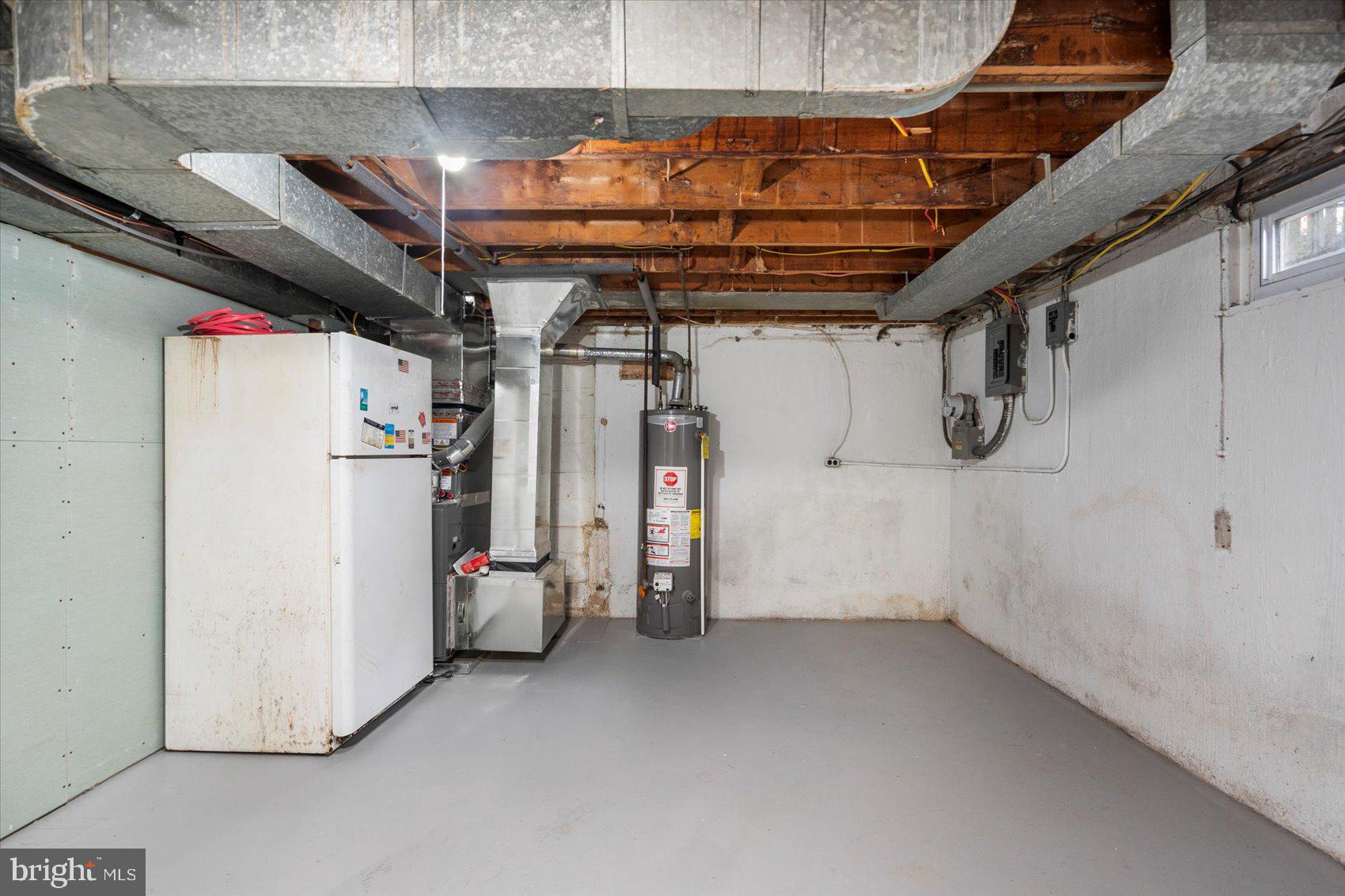 1444 Meridene Drive Baltimore, MD 21239 - Photo 32 of 36 a view of storage and utility room