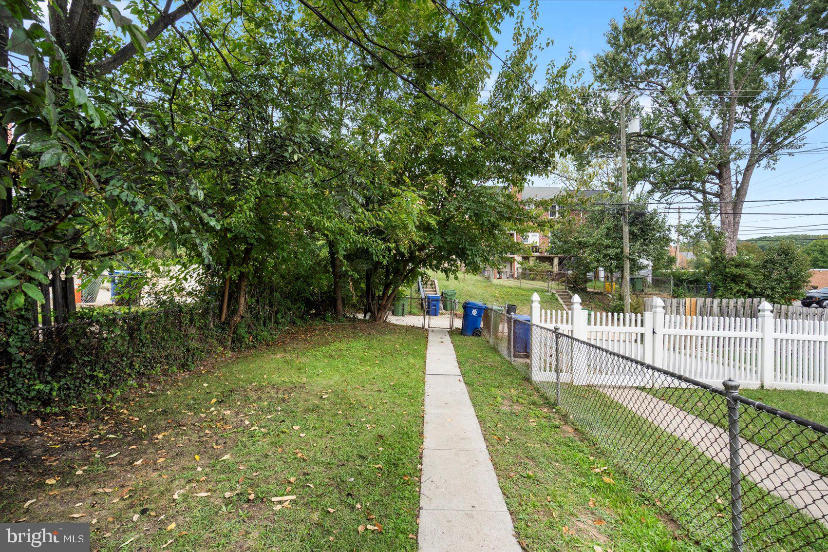 1444 Meridene Drive Baltimore, MD 21239 - Photo 34 of 36 a view of a backyard with pathway