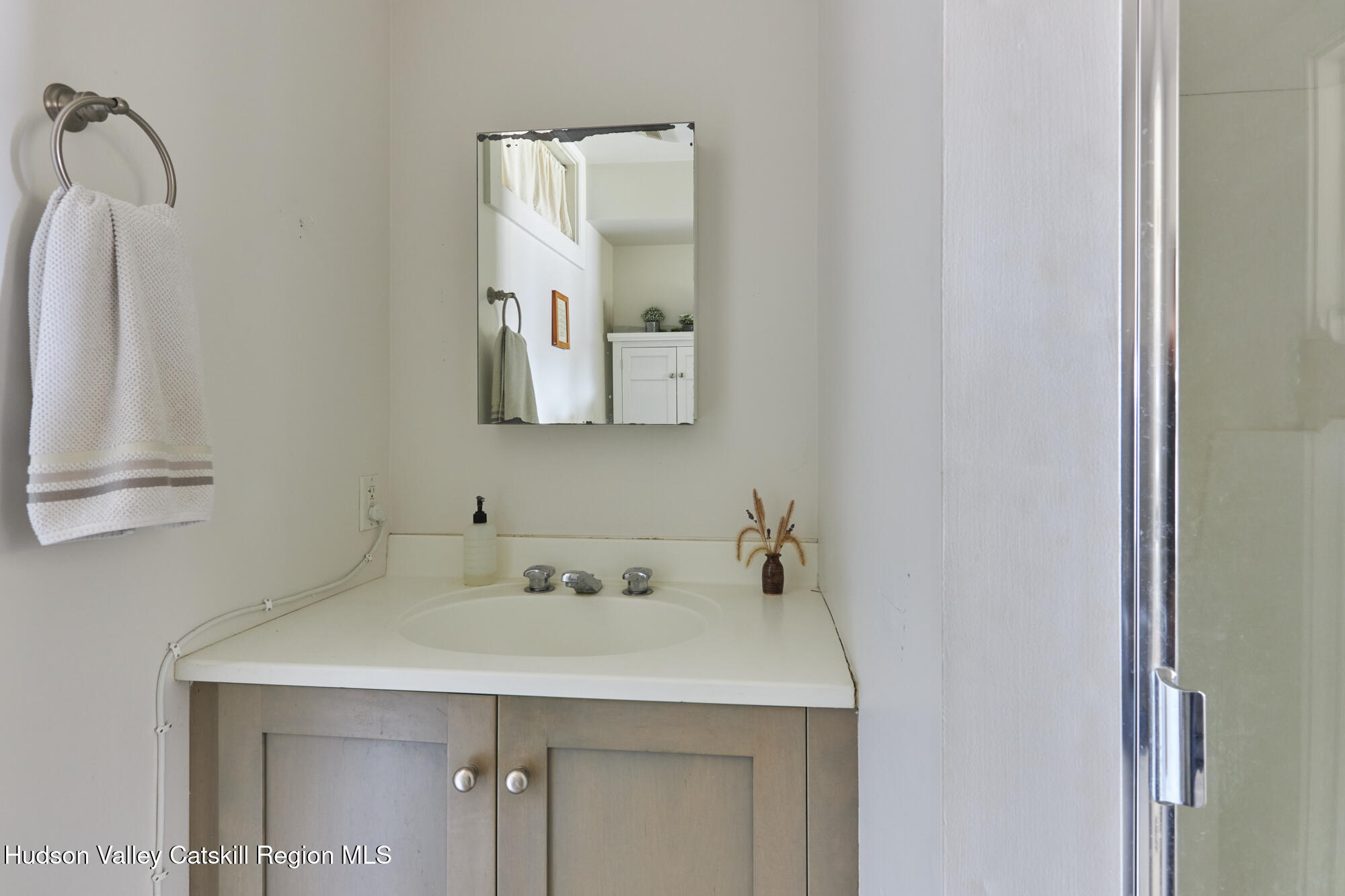 87 Kaye Road Millerton, NY 12546 - Photo 33 of 46 a bathroom with a sink and a mirror