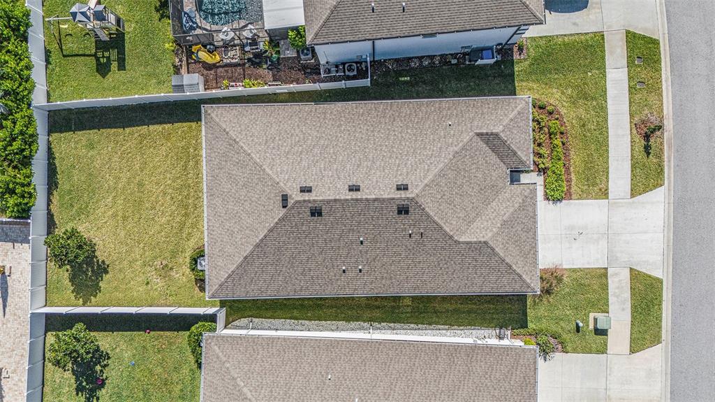 10903 Honor Road Tampa, FL 33625 - Photo 30 of 36 an aerial view of a house with a garden