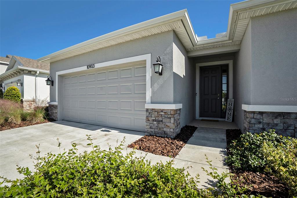 10903 Honor Road Tampa, FL 33625 - Photo 3 of 36 a front view of a house