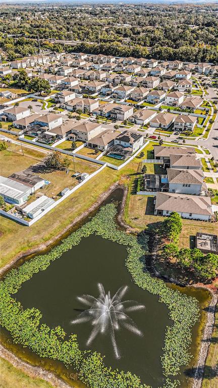 10903 Honor Road Tampa, FL 33625 - Photo 35 of 36 an aerial view of residential houses with outdoor space