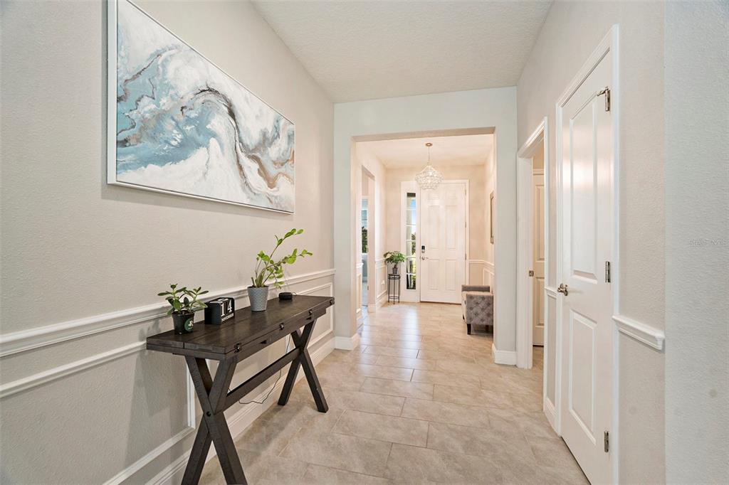 10903 Honor Road Tampa, FL 33625 - Photo 5 of 36 a view of a hallway with workspace and a window