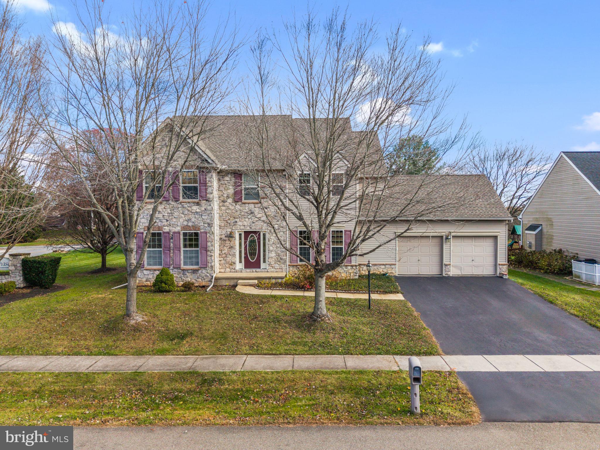 2 Radence Lane West Grove, PA 19390 - Photo 1 of 24 a front view of house with yard
