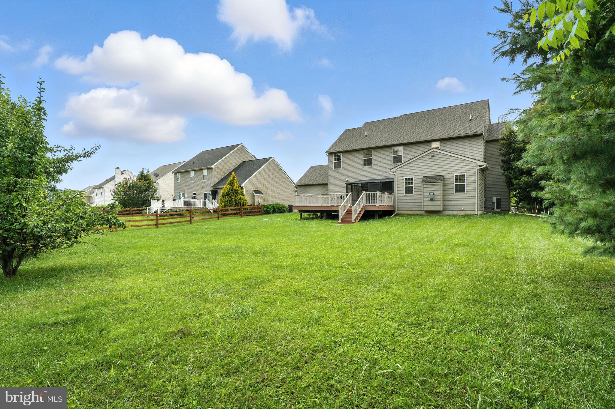 2 Radence Lane West Grove, PA 19390 - Photo 23 of 24 a view of a house with a big yard and large trees