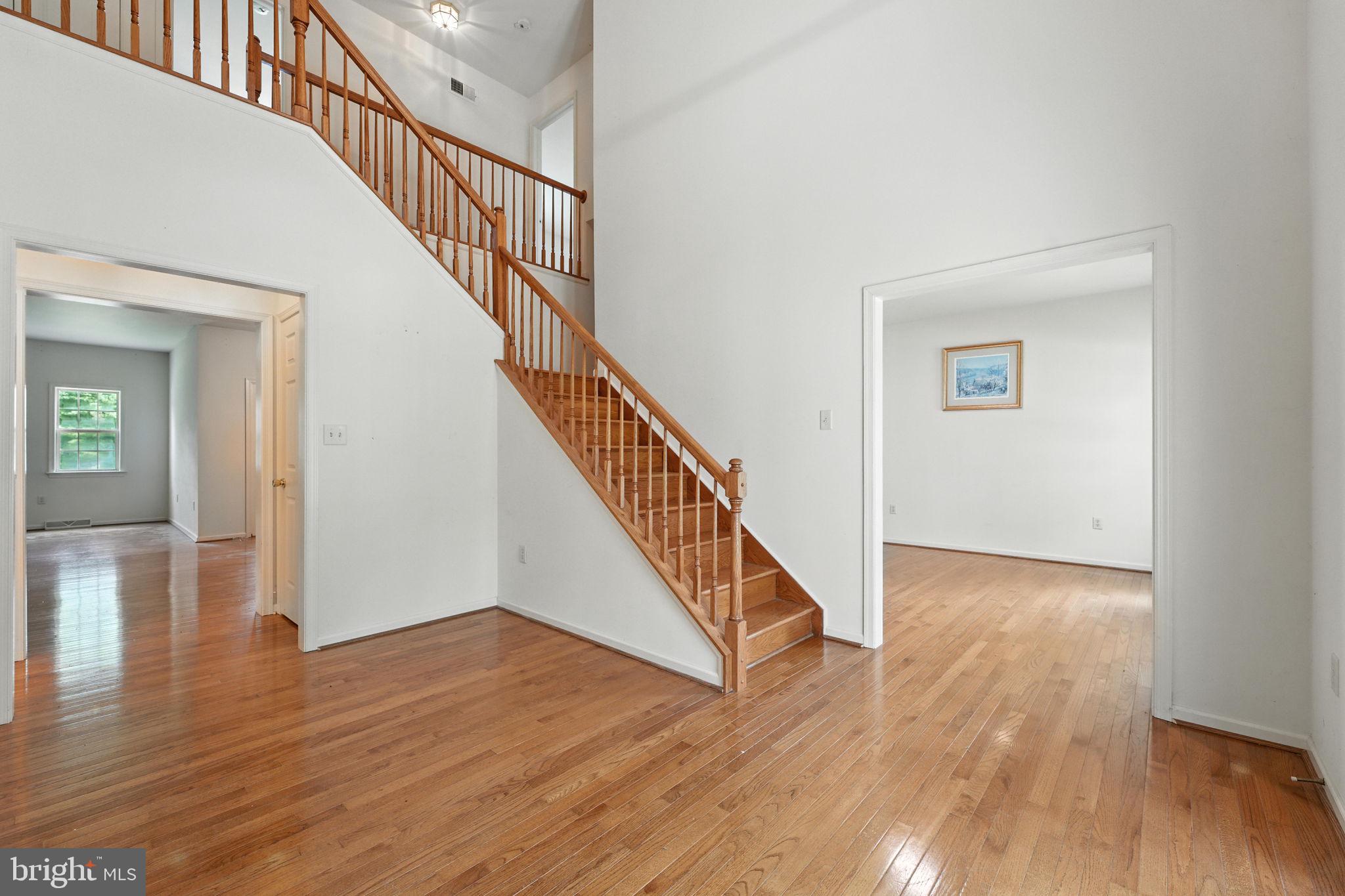 2 Radence Lane West Grove, PA 19390 - Photo 6 of 24 a view of staircase with wooden floor and white walls
