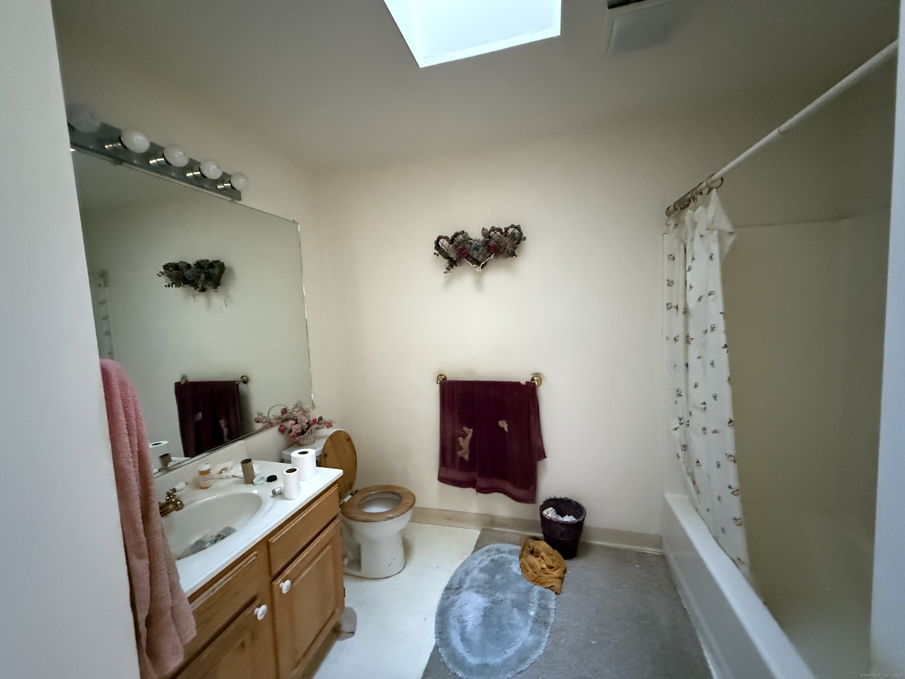 18 Ridgebury Drive Trumbull, CT 06611 - Photo 3 of 21 a view of a workspace with furniture and a front door