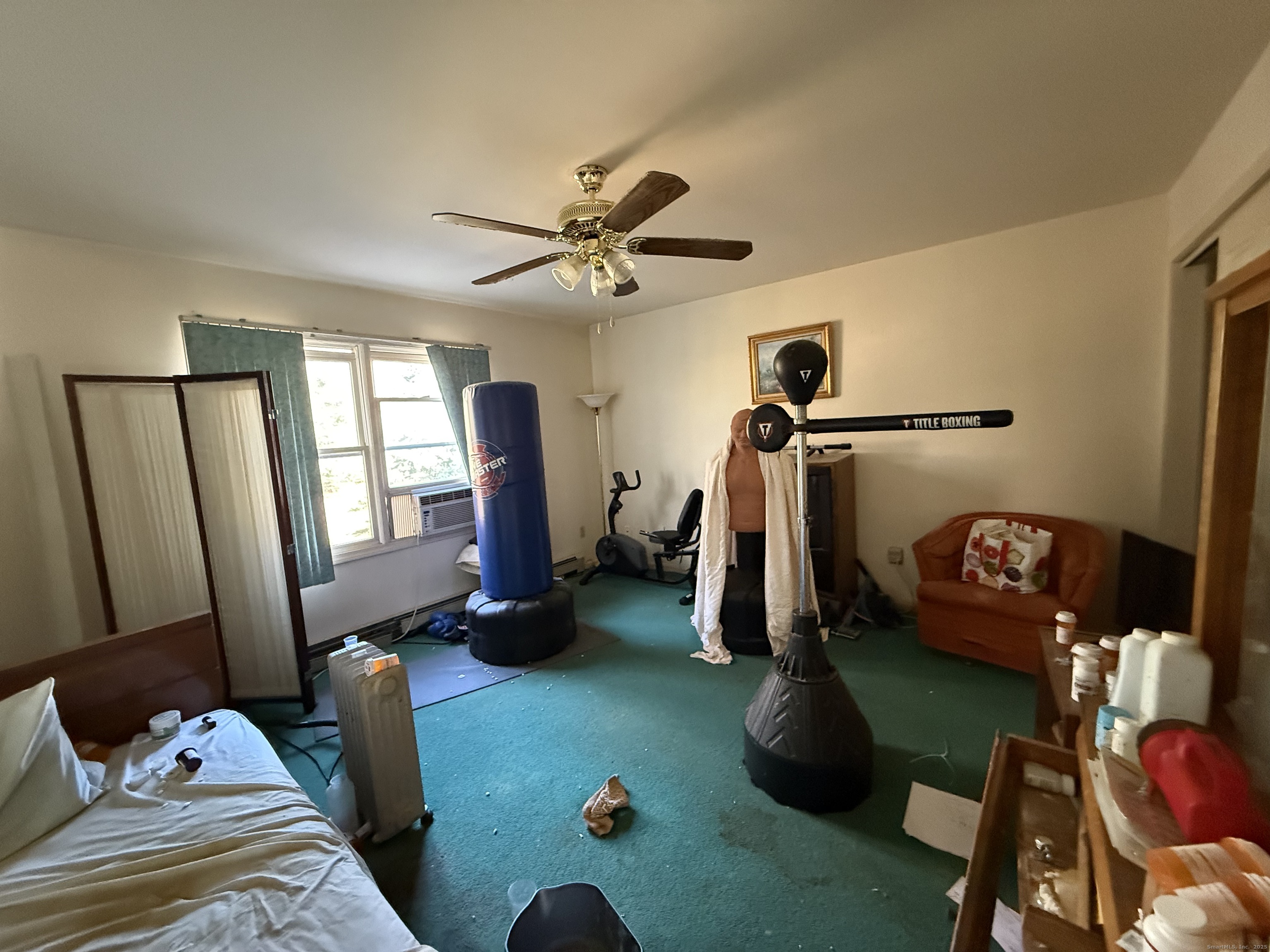 18 Ridgebury Drive Trumbull, CT 06611 - Photo 5 of 21 a bedroom with a bed and a window