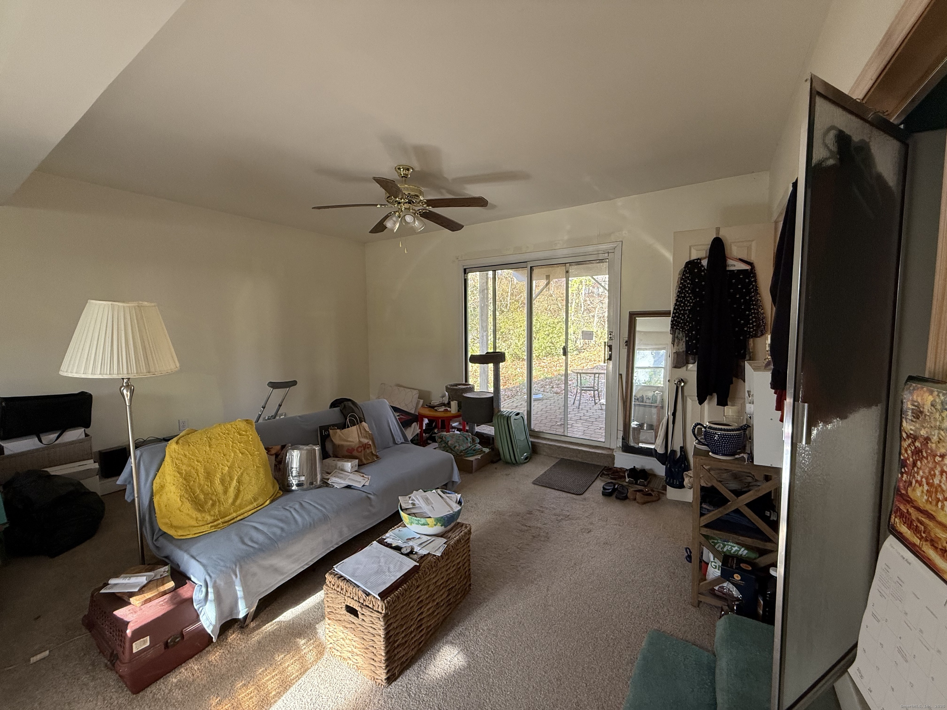 18 Ridgebury Drive Trumbull, CT 06611 - Photo 6 of 21 a living room with furniture and a flat screen tv