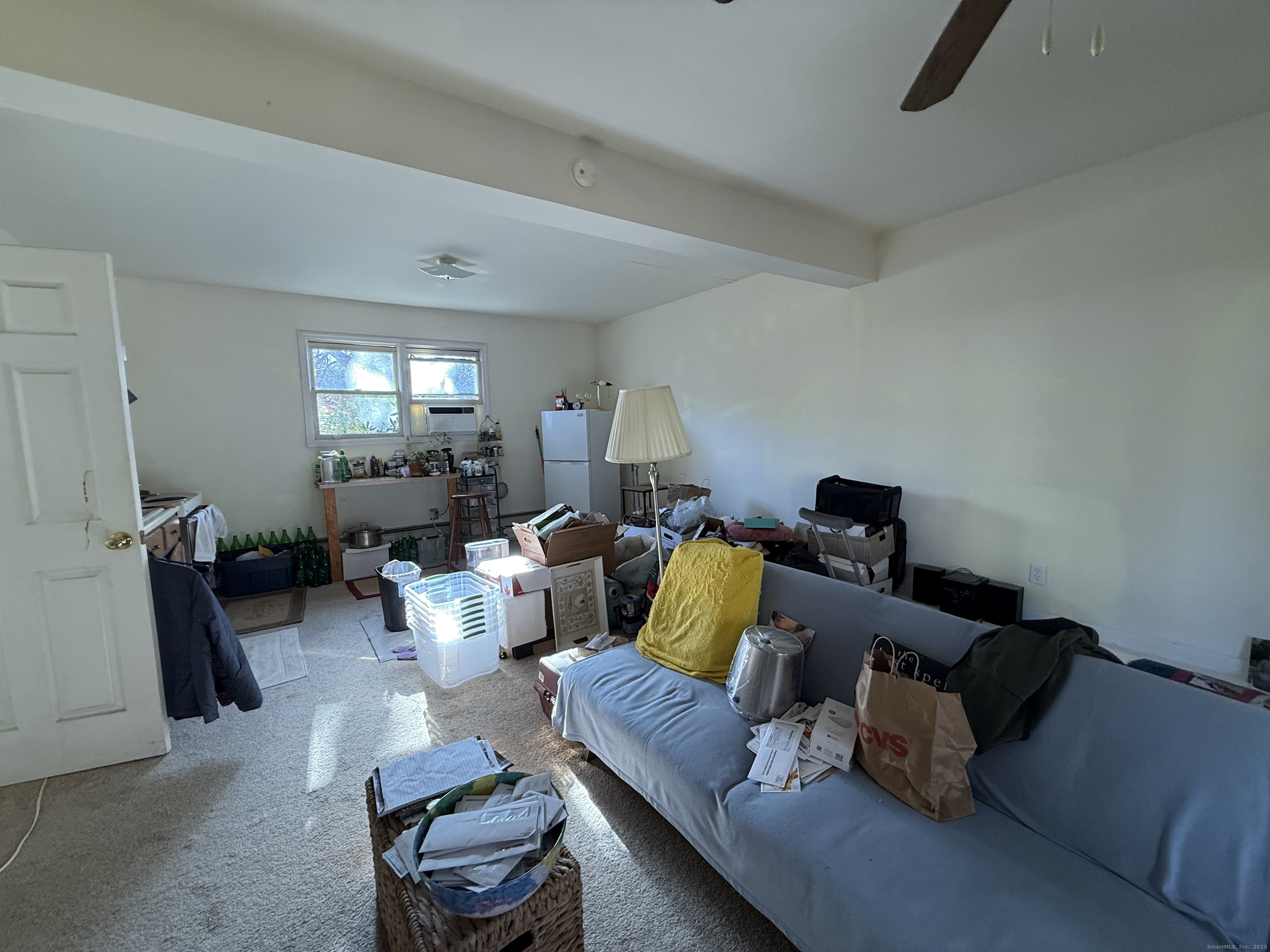 18 Ridgebury Drive Trumbull, CT 06611 - Photo 7 of 21 a living room with furniture and a couch
