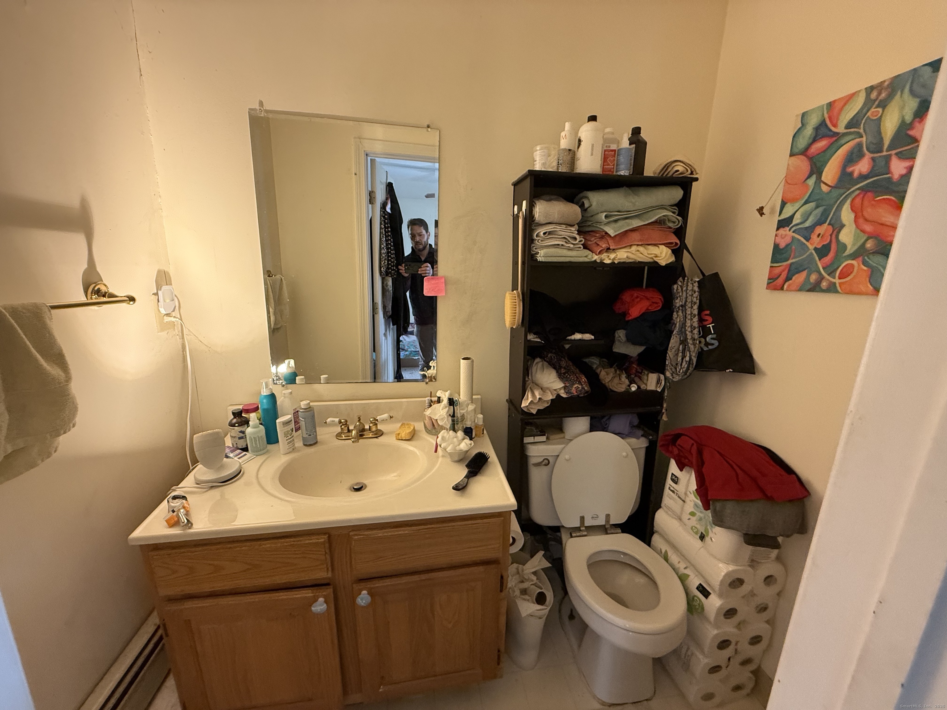 18 Ridgebury Drive Trumbull, CT 06611 - Photo 8 of 21 a bathroom with a sink toilet and mirror