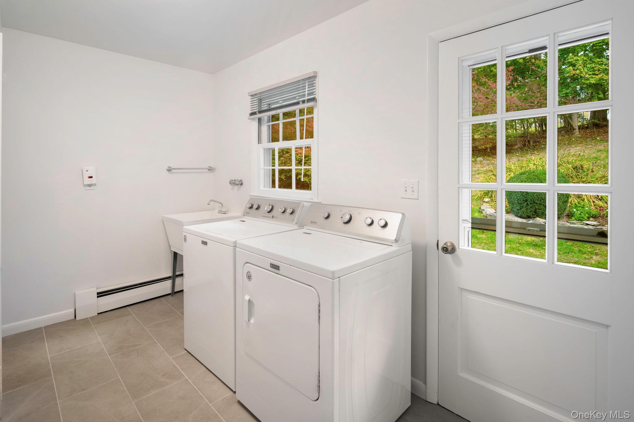 111 Seven Bridges Road Chappaqua, NY 10514 - Photo 20 of 29 a utility room with dryer and washer