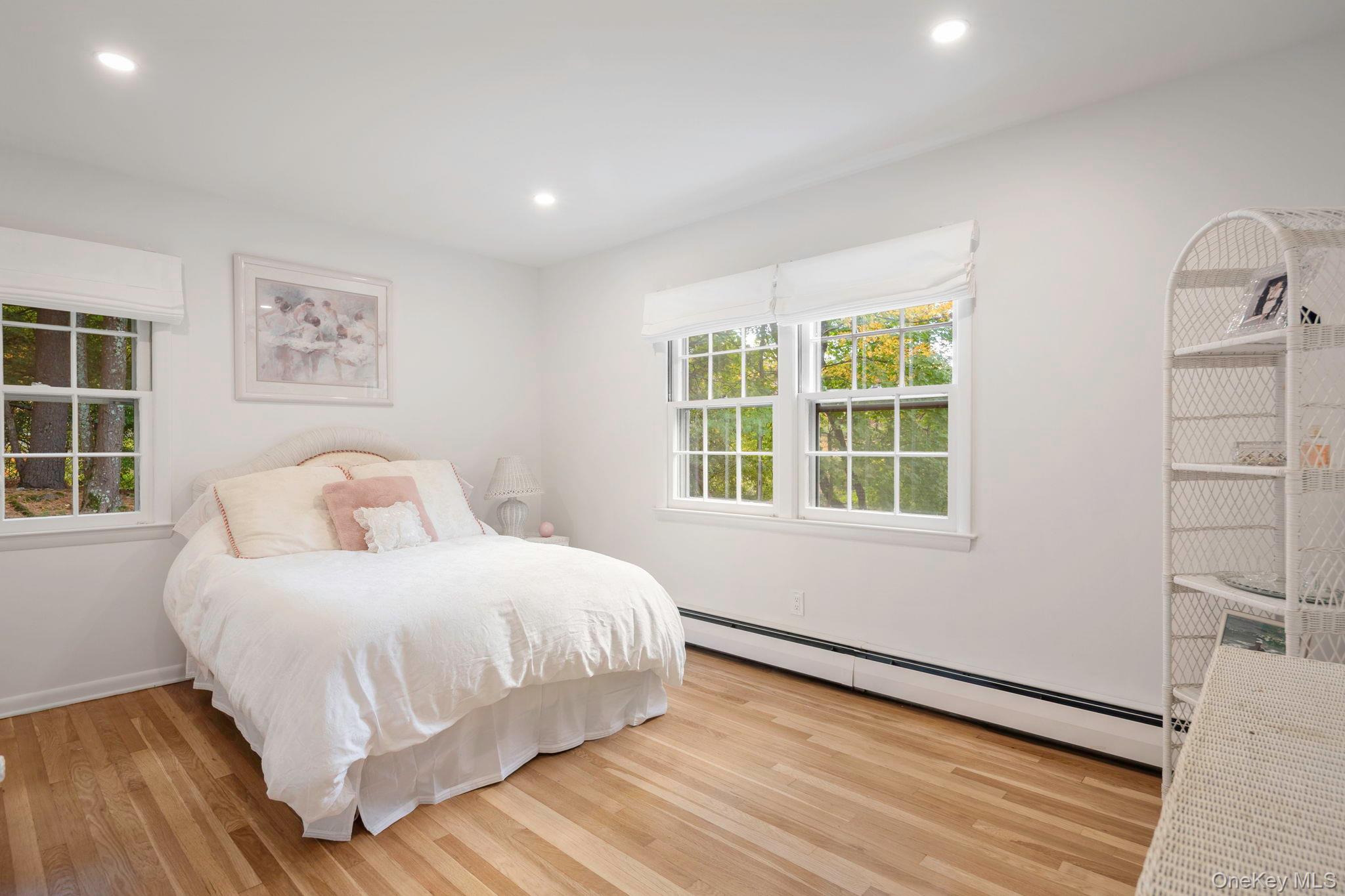 111 Seven Bridges Road Chappaqua, NY 10514 - Photo 26 of 29 a bedroom with a bed and a window