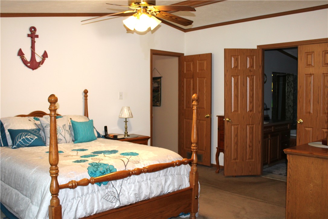 21 King Philip Road Coventry, RI 02816 - Photo 24 of 31 Primary Ensuite with bathroom, tub, shower, toilet, and oversized walkin closet