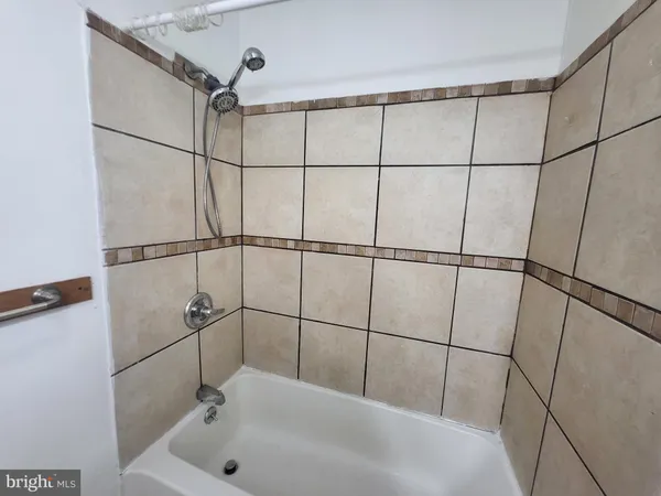 a bathroom with a sink and a bathtub