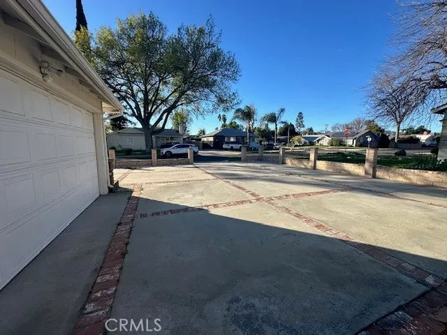 a view of a yard with table and chair