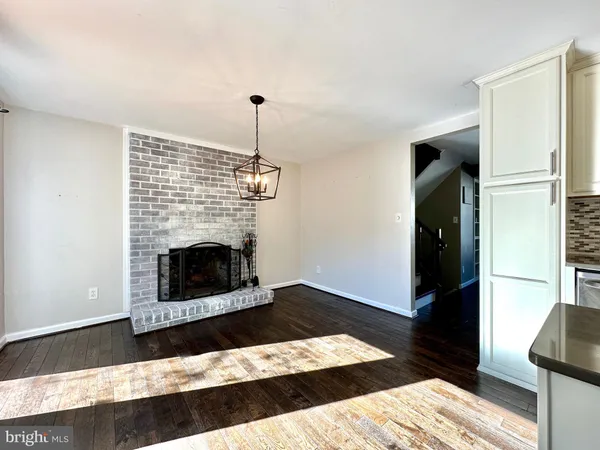 a living room with a fireplace