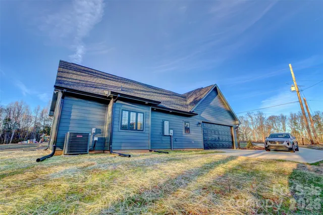 a house view with a backyard space