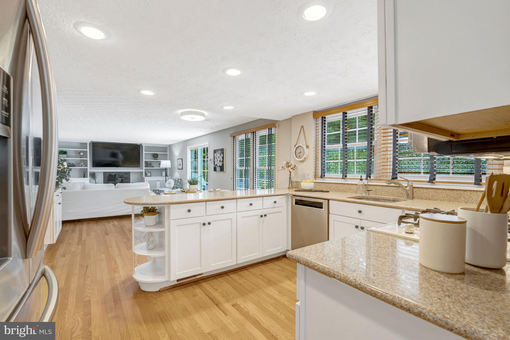 7809 Roundabout Way Springfield, VA 22153 - Photo 27 of 83 Kitchen flows effortlessly into nook & family room