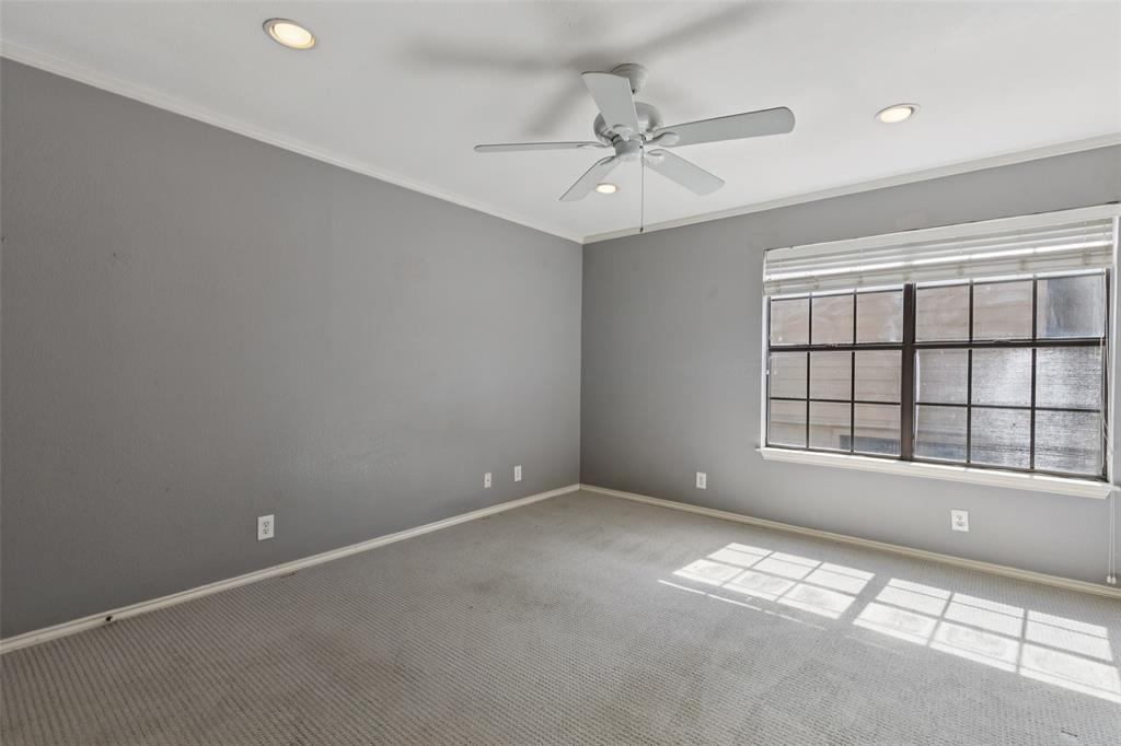 5200 Martel Avenue, Unit 36A Dallas, TX 75206 - Photo 16 of 34 a view of an empty room with a window
