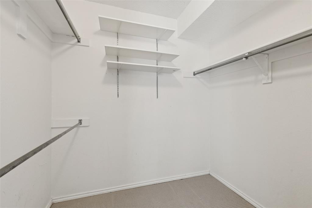 5200 Martel Avenue, Unit 36A Dallas, TX 75206 - Photo 18 of 34 a view of an empty walk in closet