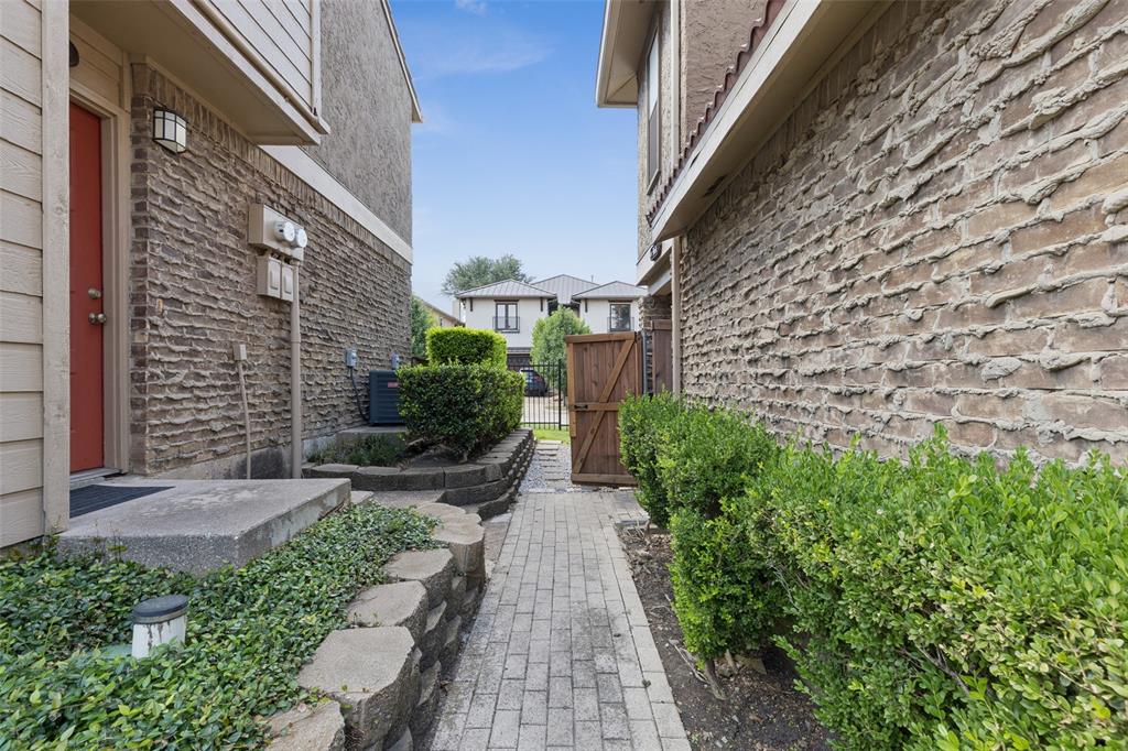 5200 Martel Avenue, Unit 36A Dallas, TX 75206 - Photo 2 of 34 a view of a pathway both side of house