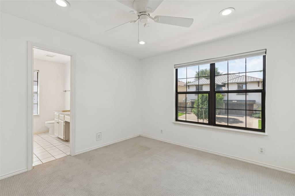 5200 Martel Avenue, Unit 36A Dallas, TX 75206 - Photo 21 of 34 an empty room with a empty space and windows
