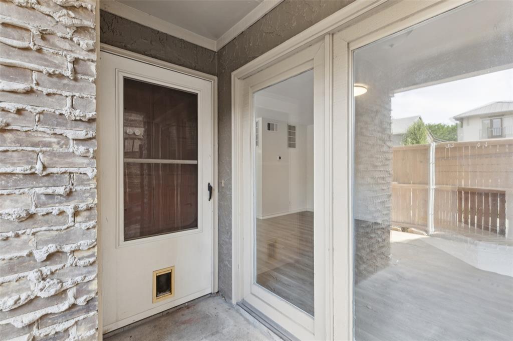 5200 Martel Avenue, Unit 36A Dallas, TX 75206 - Photo 26 of 34 a view of a hallway with wooden floor and entryway