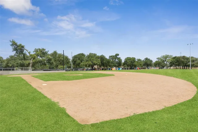 a view of a park with swings