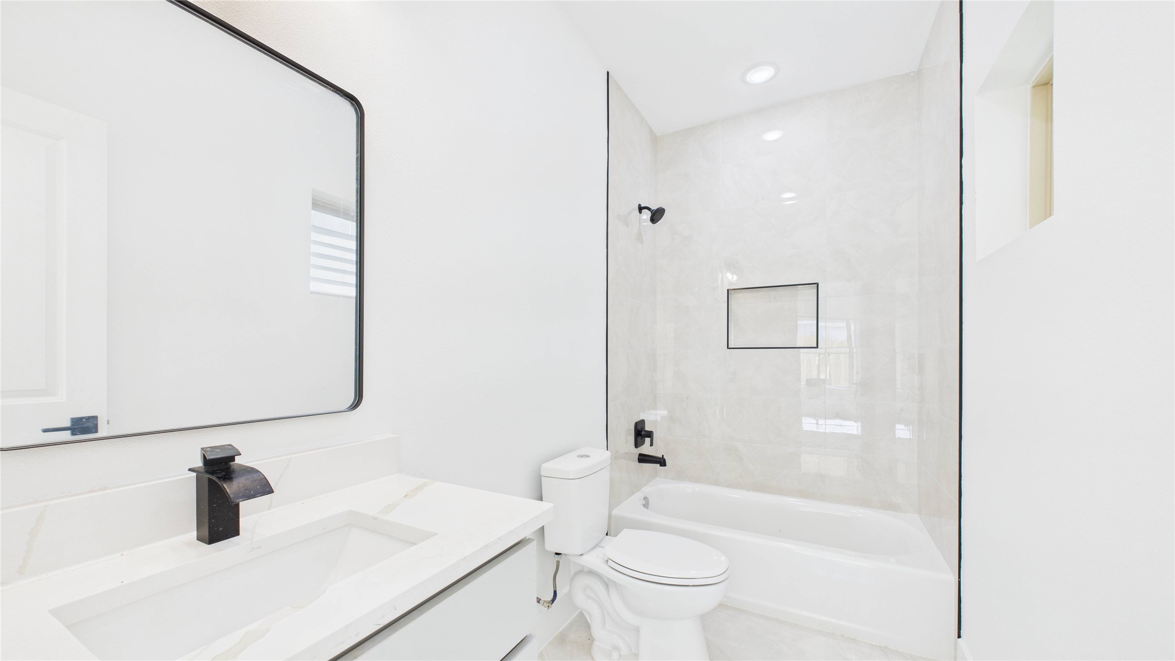5318 Terry Street Houston, TX 77009 - Photo 7 of 28 a bathroom with a sink toilet and shower
