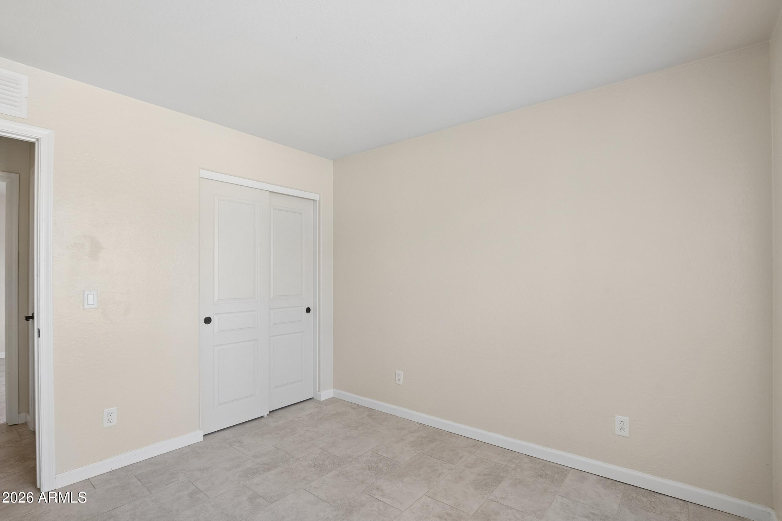 24025 West Pecan Road Buckeye, AZ 85326 - Photo 35 of 42 Looking towards Closet of Bedroom 3