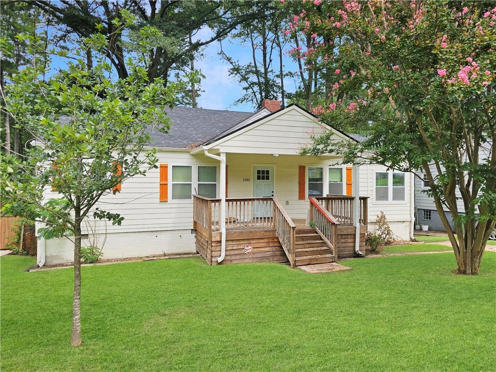 1285 Avon Avenue Southwest Atlanta, GA 30310 - Photo 1 of 28 a view of a house with a yard