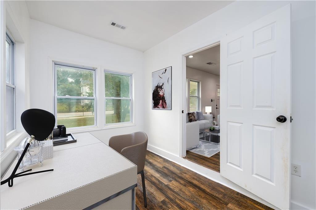 1285 Avon Avenue Southwest Atlanta, GA 30310 - Photo 11 of 28 a view of a workspace with furniture and a window