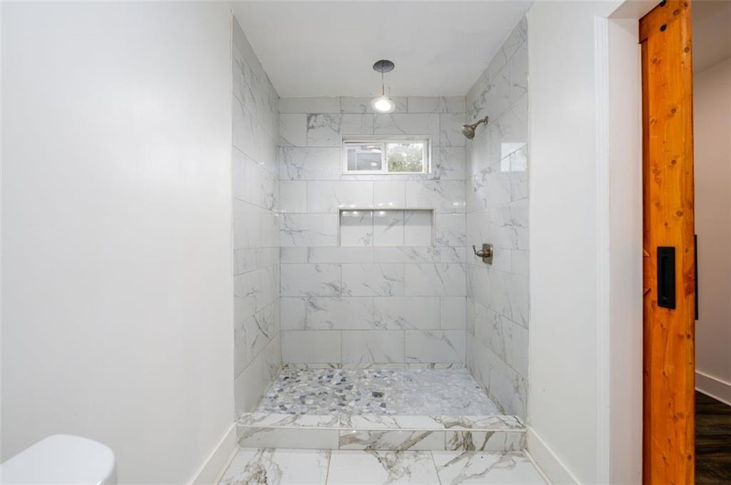 1285 Avon Avenue Southwest Atlanta, GA 30310 - Photo 14 of 28 a bathroom with a shower