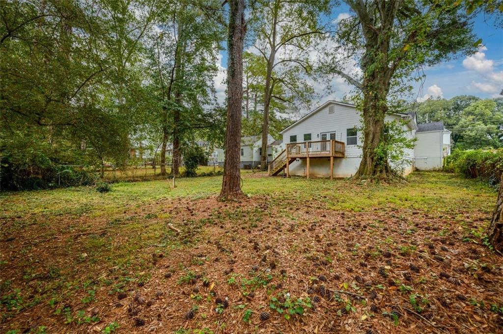 1285 Avon Avenue Southwest Atlanta, GA 30310 - Photo 26 of 28 a view of a house with a yard