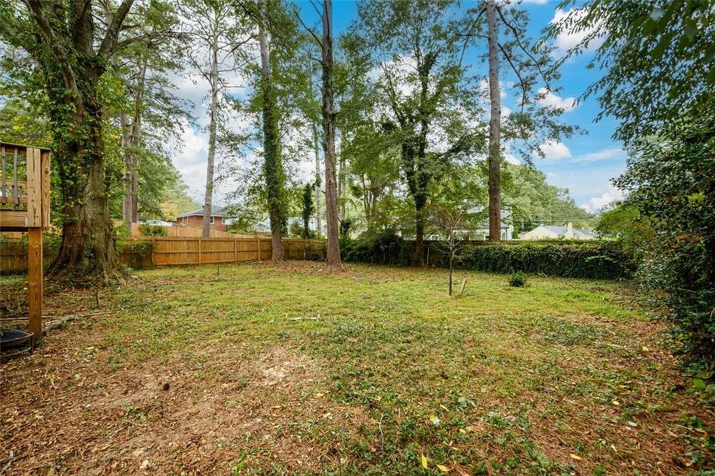 1285 Avon Avenue Southwest Atlanta, GA 30310 - Photo 27 of 28 a view of a yard with a large trees