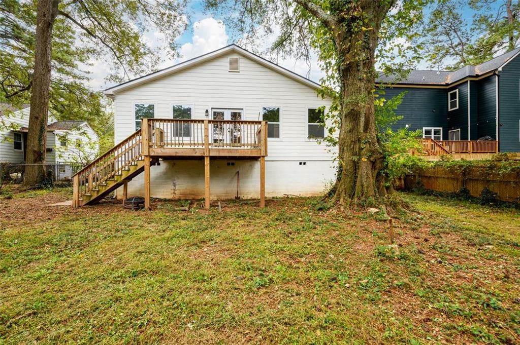 1285 Avon Avenue Southwest Atlanta, GA 30310 - Photo 28 of 28 a view of a house with a yard and sitting area