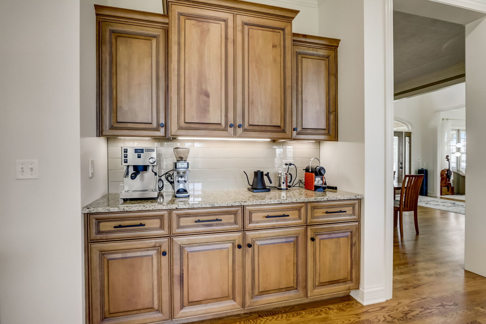 3462 Wild Prairie Lane Geneva, IL 60134 - Photo 11 of 59 a kitchen with stainless steel appliances granite countertop a sink and cabinets