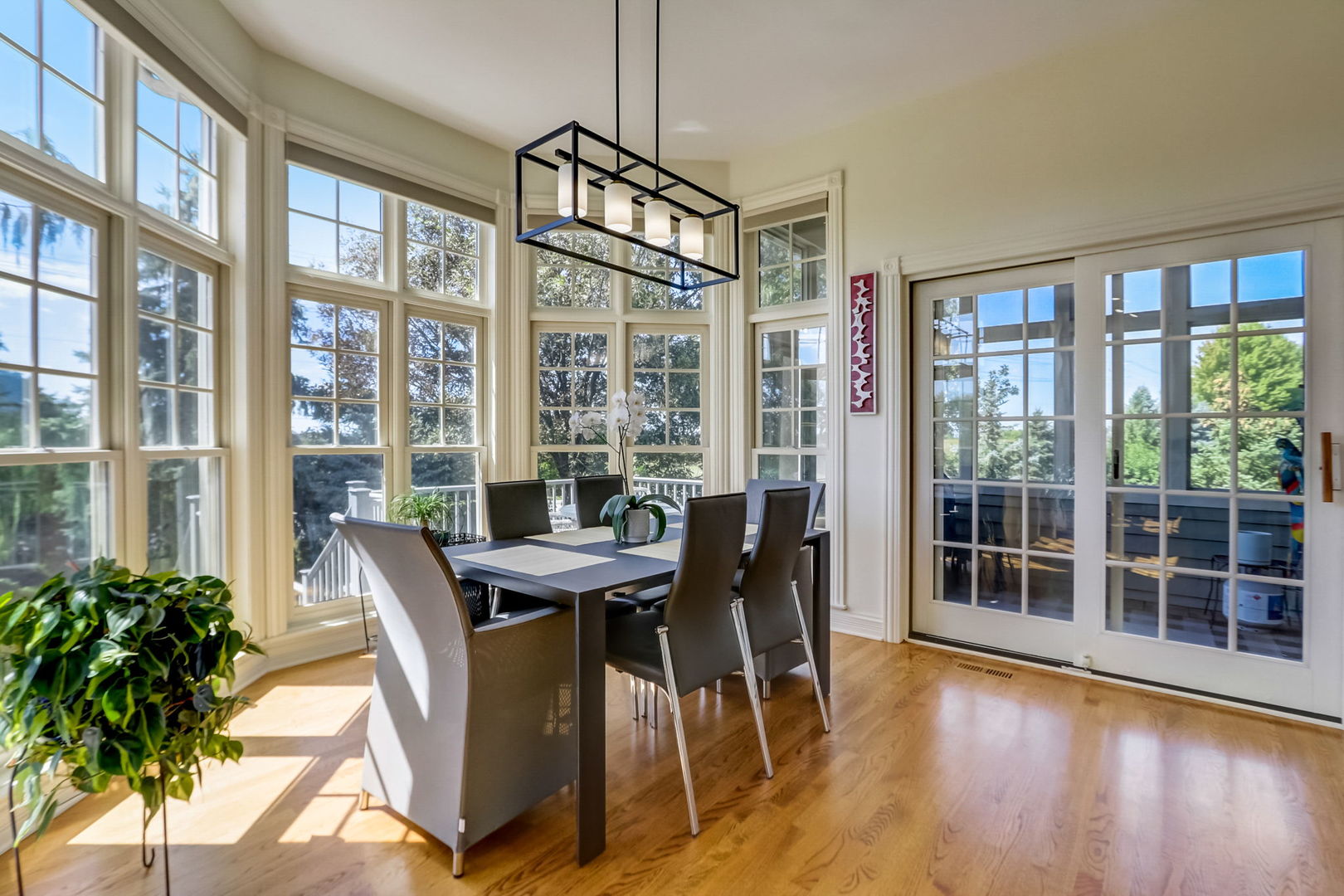 3462 Wild Prairie Lane Geneva, IL 60134 - Photo 17 of 59 a view of a dining room with furniture window and wooden floor