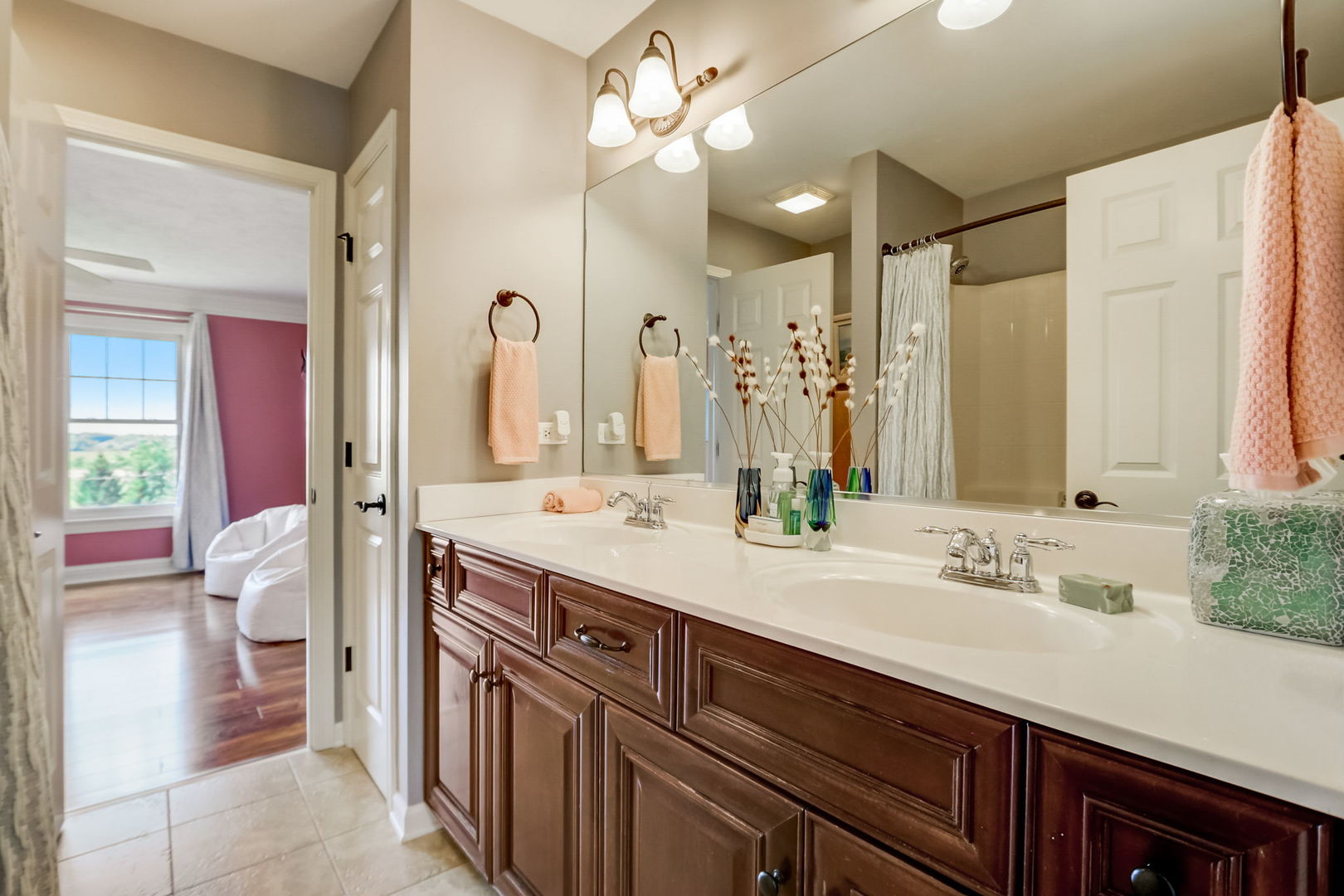 3462 Wild Prairie Lane Geneva, IL 60134 - Photo 26 of 59 a spacious bathroom with a double vanity sink mirror and toilet